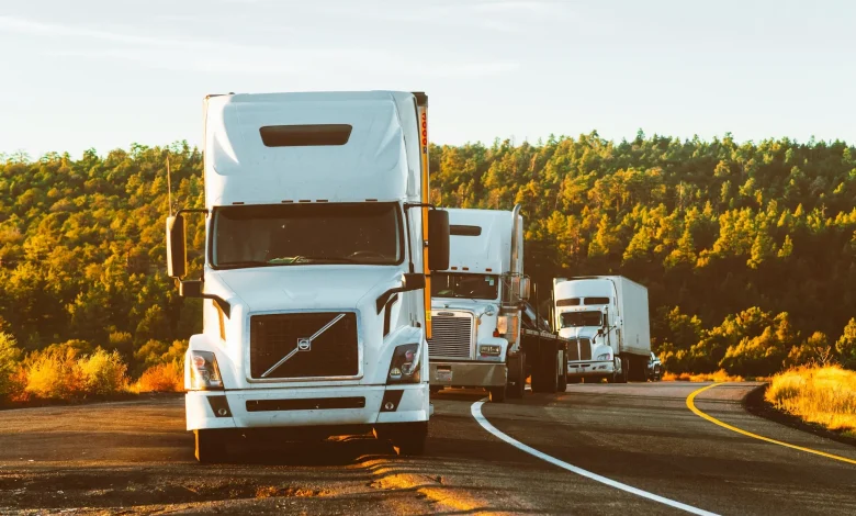 Top diesel trucks lined up on a highway in 2025